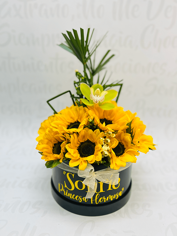 Cilíndro girasol y orquídea